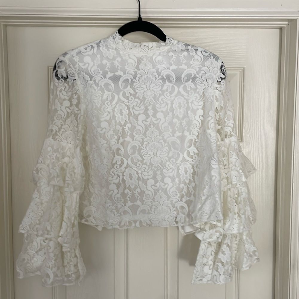 White shirt buttons up the back
